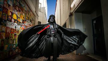 Jason Zimmerman dressed as Darth Vader at the arts precint ahead of Comic Gong 2017. Picture by Adam McLean.
